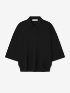 Black unisex knit polo shirt with 3/4 sleeves and ribbed trims