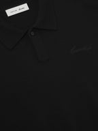 Black unisex knit polo shirt with 3/4 sleeves and ribbed trims