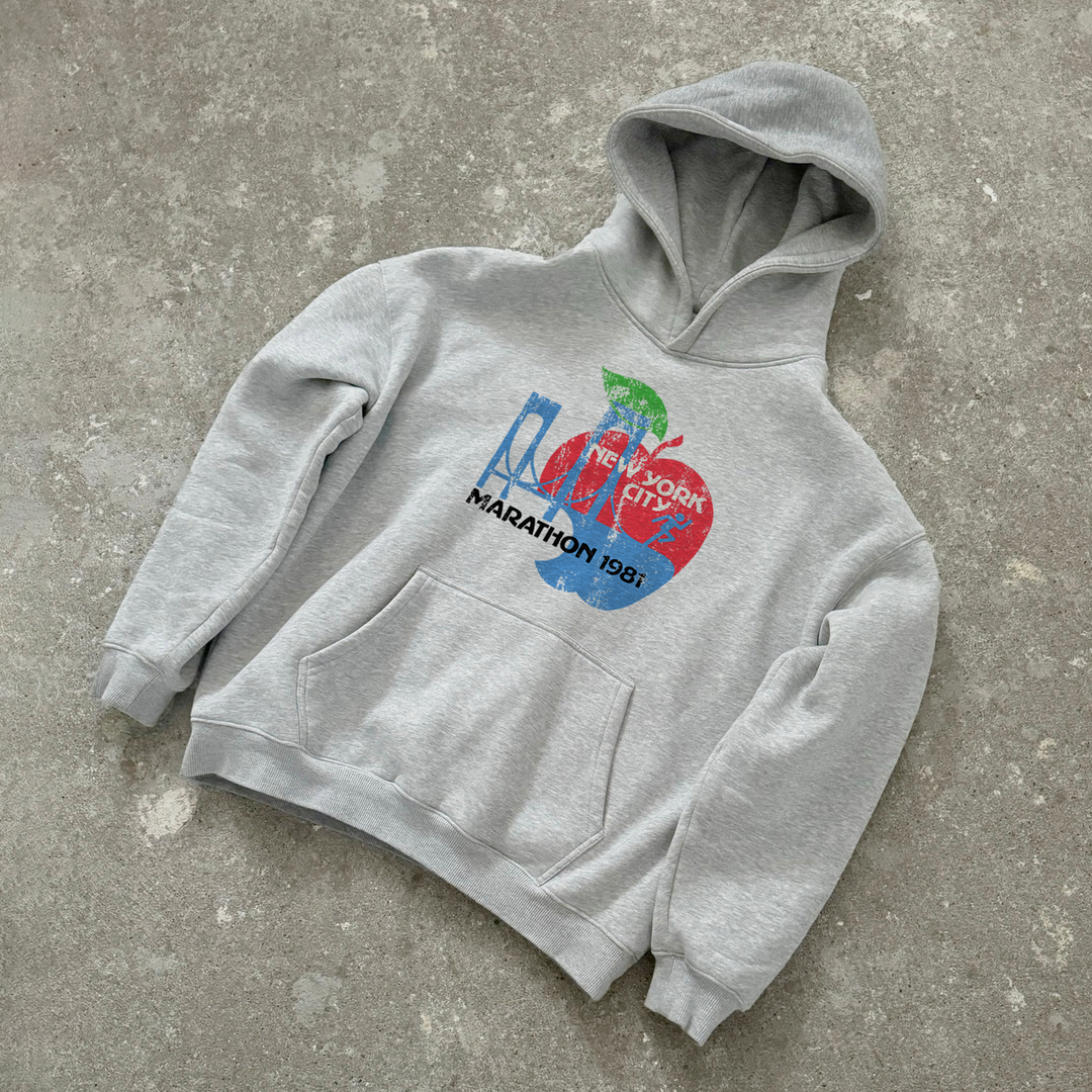 Grey hoodie with colourful New York City Marathon 1981 graphic and front pouch pocket