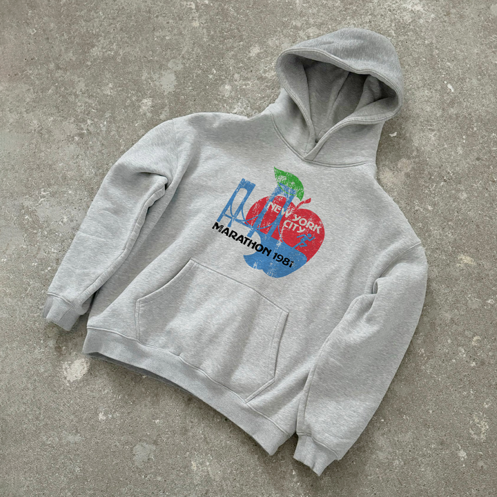Grey hoodie with colourful New York City Marathon 1981 graphic and front pouch pocket