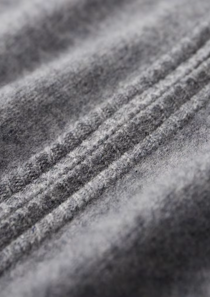 Men's two-tone grey knit tracksuit set with a zip jacket and drawstring trousers