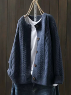 Women's cable-knit cardigan with crew neckline, long sleeves and button front