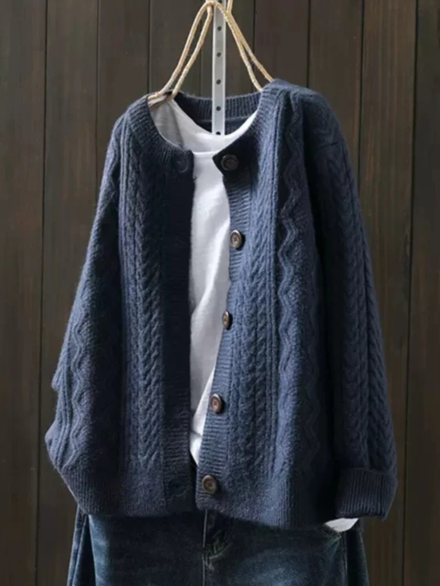 Women's cable-knit cardigan with crew neckline, long sleeves and button front