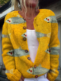 Women's yellow cardigan with repeated illustrated fish motifs, V-neckline, buttons and long sleeves