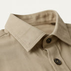 Men's long sleeve textured shirt with pointed collar and button front