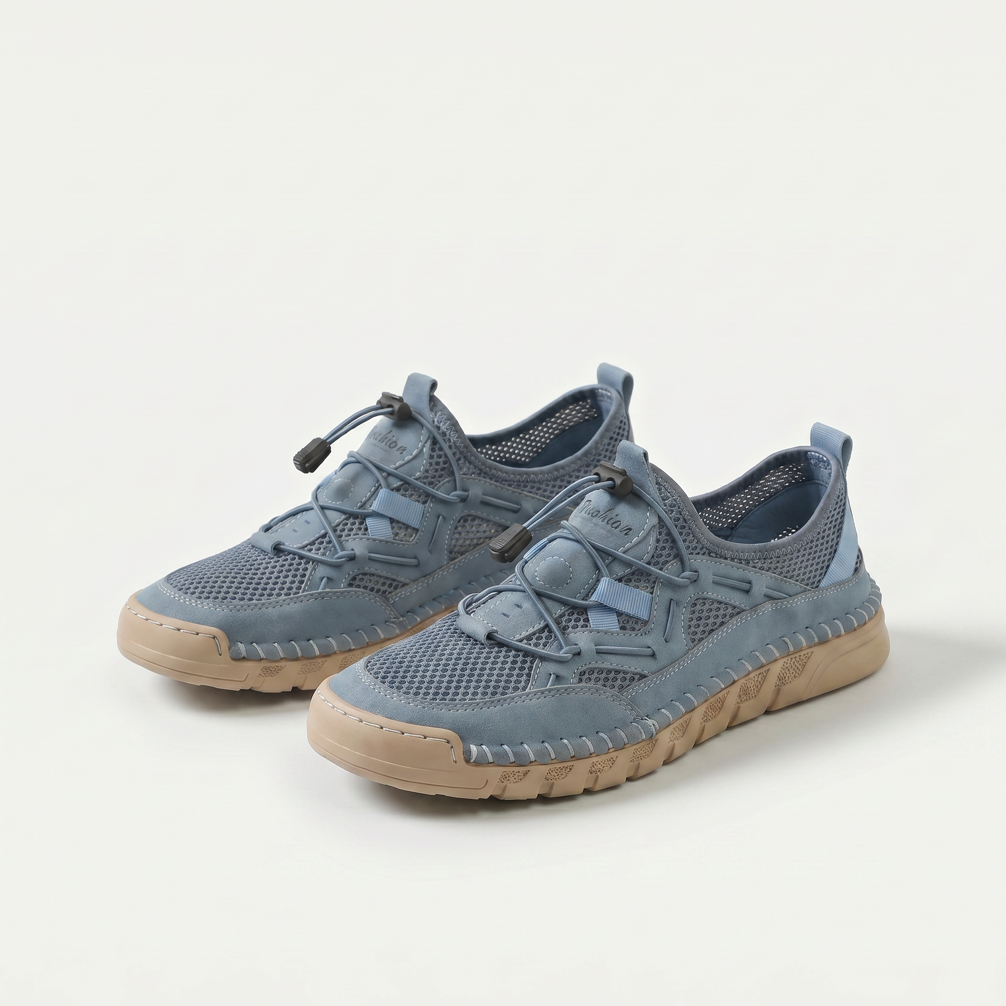 Mesh sneakers with toggle laces and segmented flat soles