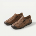 Low-top lace-up sneakers with side zip and flat contrasting soles