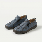 Low-top lace-up sneakers with side zip and flat contrasting soles