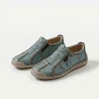 Low-top lace-up sneakers with side zip and flat contrasting soles