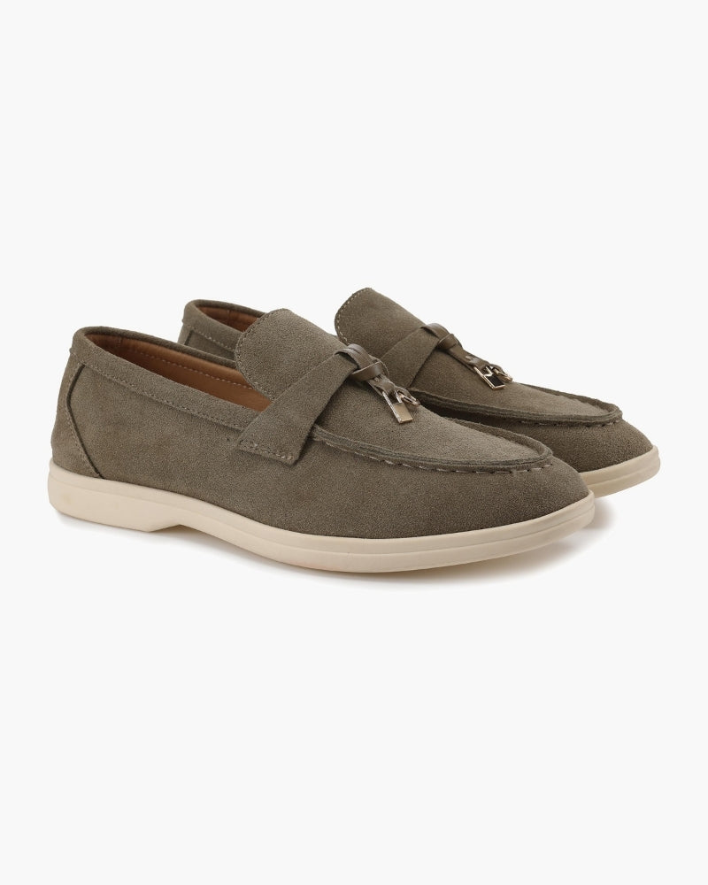 Women's slip-on loafers with moc toe stitching and metal horsebit detail