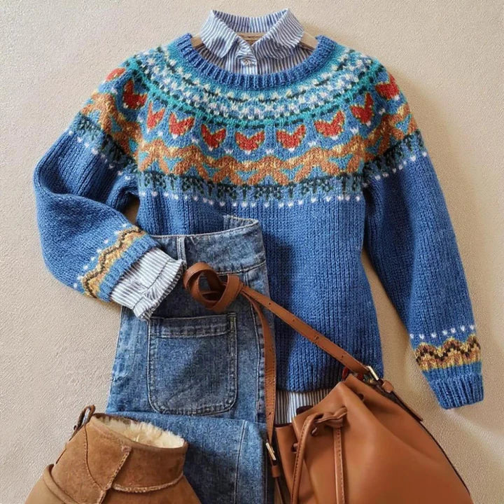 Blue geometric patterned knit sweater with crew neck and long sleeves