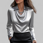 Women's long-sleeve blouse with draped neckline and pointed collar