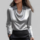 Women's long-sleeve blouse with draped neckline and pointed collar