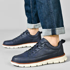 Low top lace-up sneaker with stitched panels and chunky textured sole