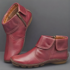 Ankle boots with foldover cuffs, side zips and textured soles