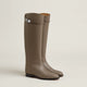 Women's tall riding boots with low heels, round toes and strap detailing