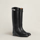 Women's tall riding boots with low heels, round toes and strap detailing
