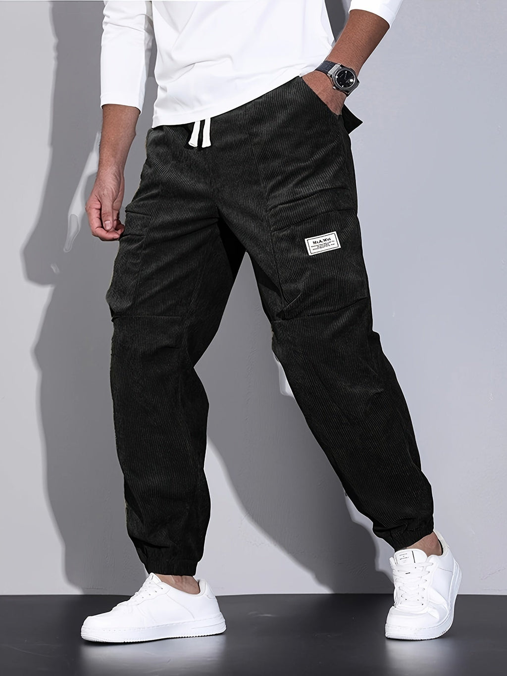 Men's corduroy cargo trousers with drawstring waist and cuffed hems
