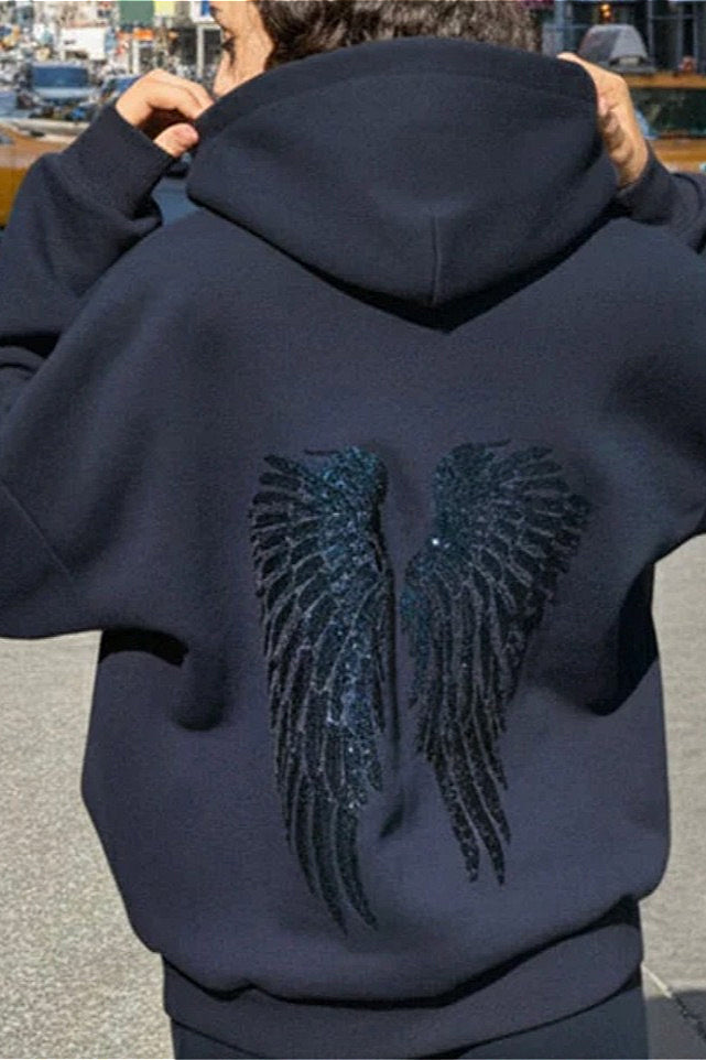 Women's relaxed hooded sweatshirt with sequin wing graphic on the back
