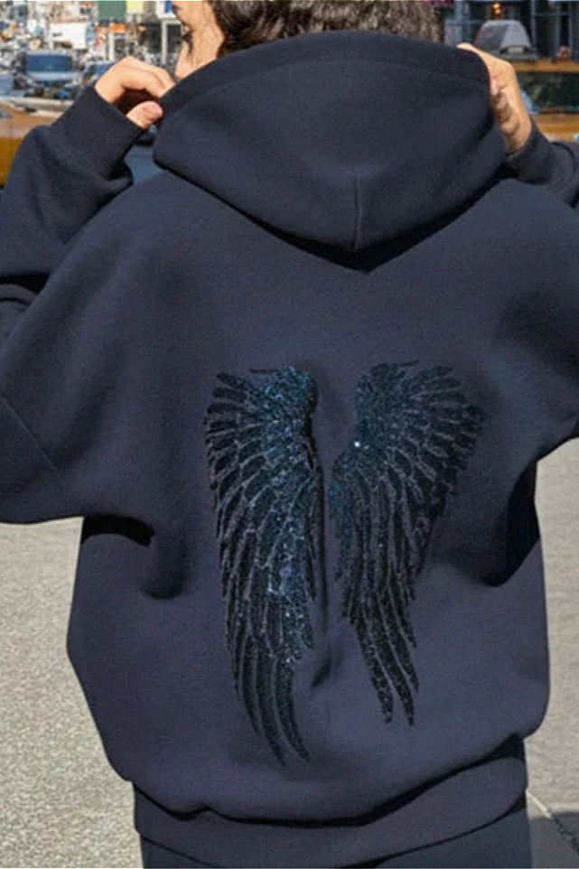 Women's relaxed hooded sweatshirt with sequin wing graphic on the back