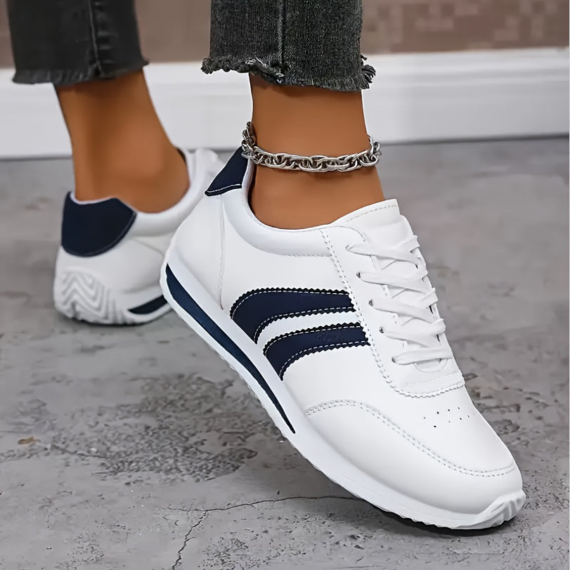 Women's white lace-up sneakers with dark side stripes
