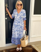 Women's floral V-neck midi dress with three-quarter sleeves