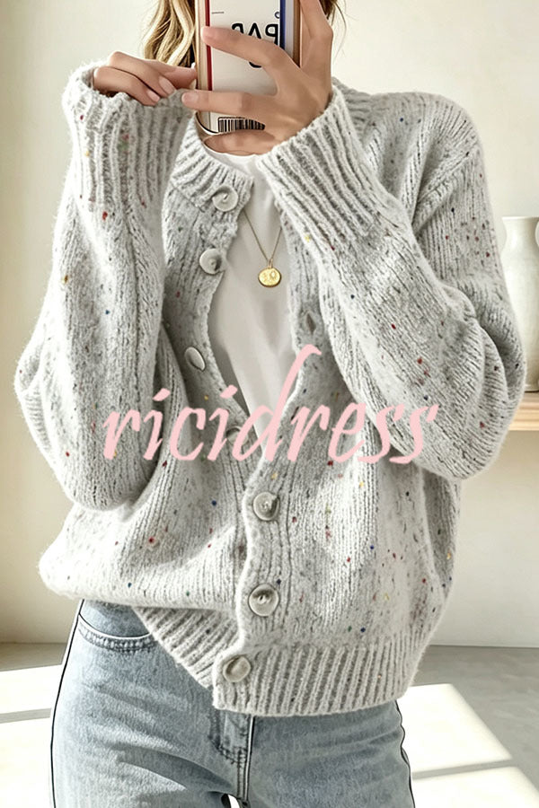 Women's knitted cardigan with scattered dots, long sleeves and button front