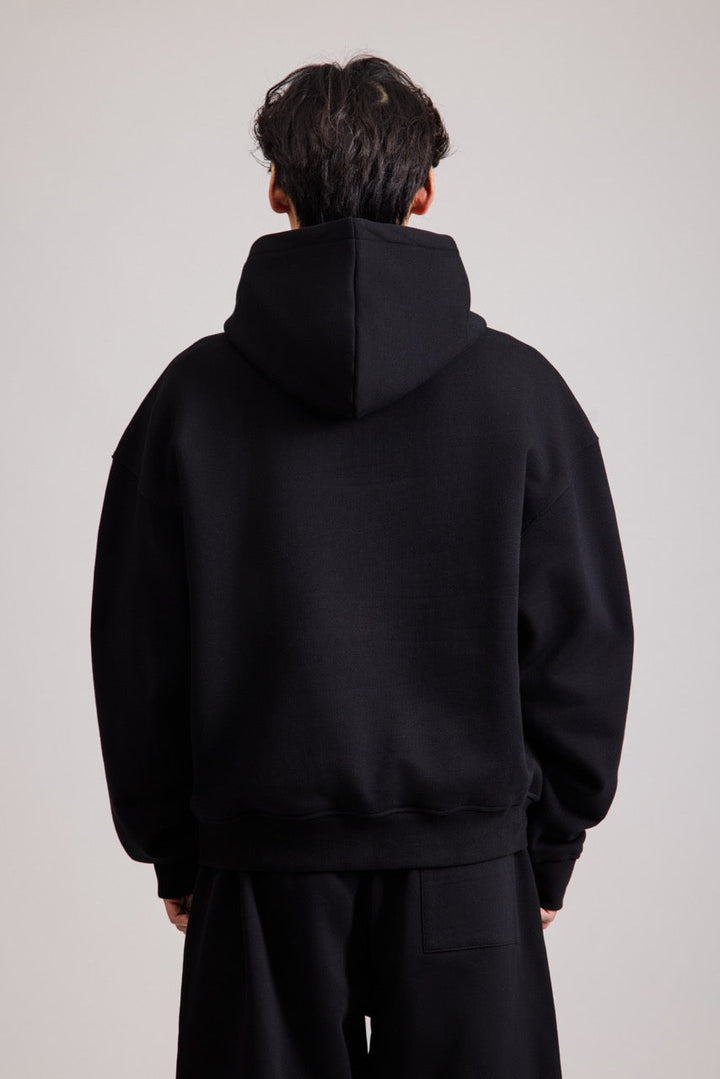Men's black pullover hoodie with hood and front pouch pocket
