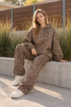 Women's leopard print hooded sweatshirt and matching full-length trousers set