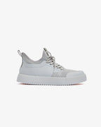 Grey low-top lace-up sneakers with mesh panels and flat sole