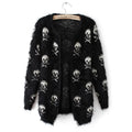 Women's black cardigan with repeated white skull and crossbones pattern