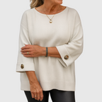 Women's round-neck sweater with three-quarter sleeves and button cuffs