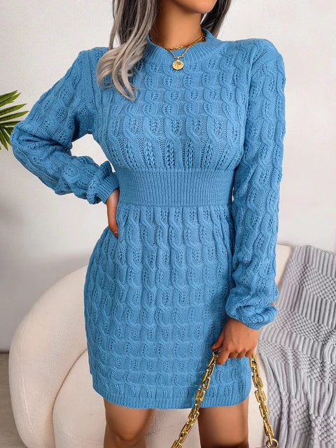 Women's cable knit sweater mini dress with crew neckline and long sleeves