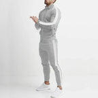Men's striped tracksuit set with zip jacket and tapered trousers