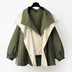 Women's hooded windbreaker jacket with contrast panels and drawstrings