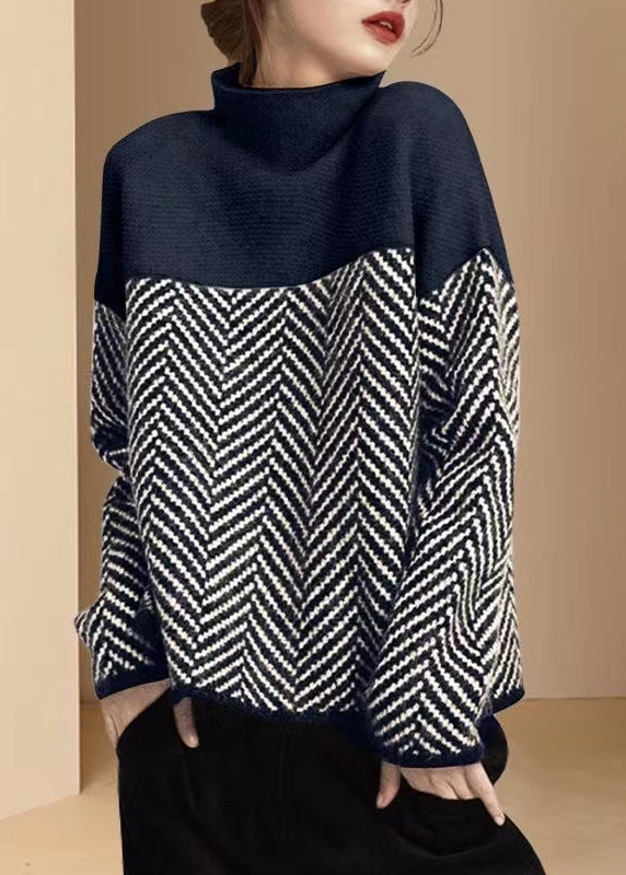 Women's turtle neck jumper with geometric chevron pattern and long sleeves