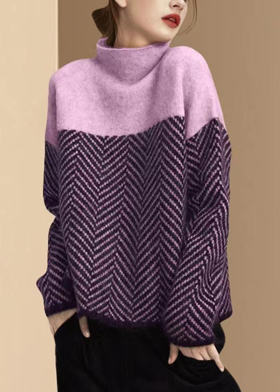 Women's turtle neck jumper with geometric chevron pattern and long sleeves