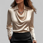 Women's long-sleeve blouse with draped neckline and pointed collar