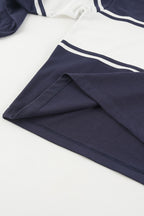 Navy and white color block polo sweatshirt with long sleeves