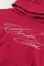 Women's red graphic hoodie with white script and kangaroo pocket