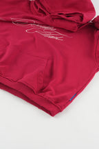 Women's red graphic hoodie with white script and kangaroo pocket