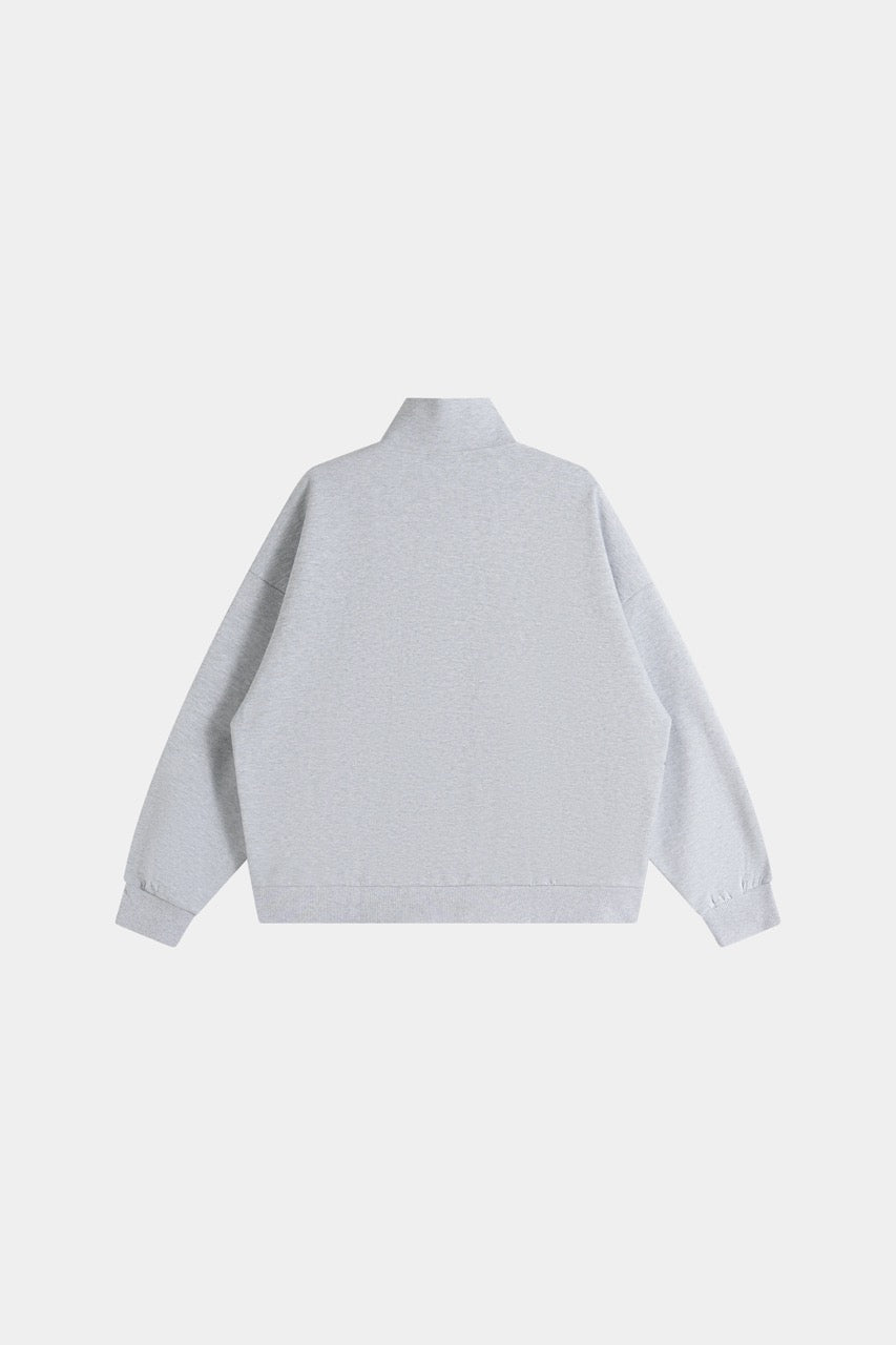 Gray cropped quarter-zip hoodie with mock neck and long sleeves