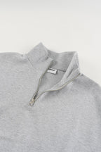 Gray cropped quarter-zip hoodie with mock neck and long sleeves