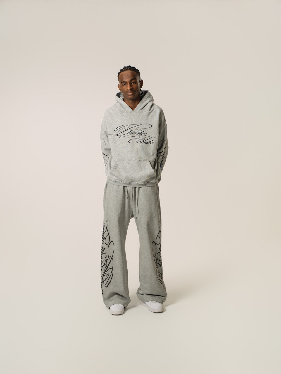 Men's grey hoodie with black script graphic, hood and kangaroo pocket