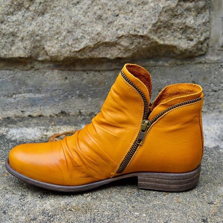 Women's ankle boots with ruched panels, side zips and low heels