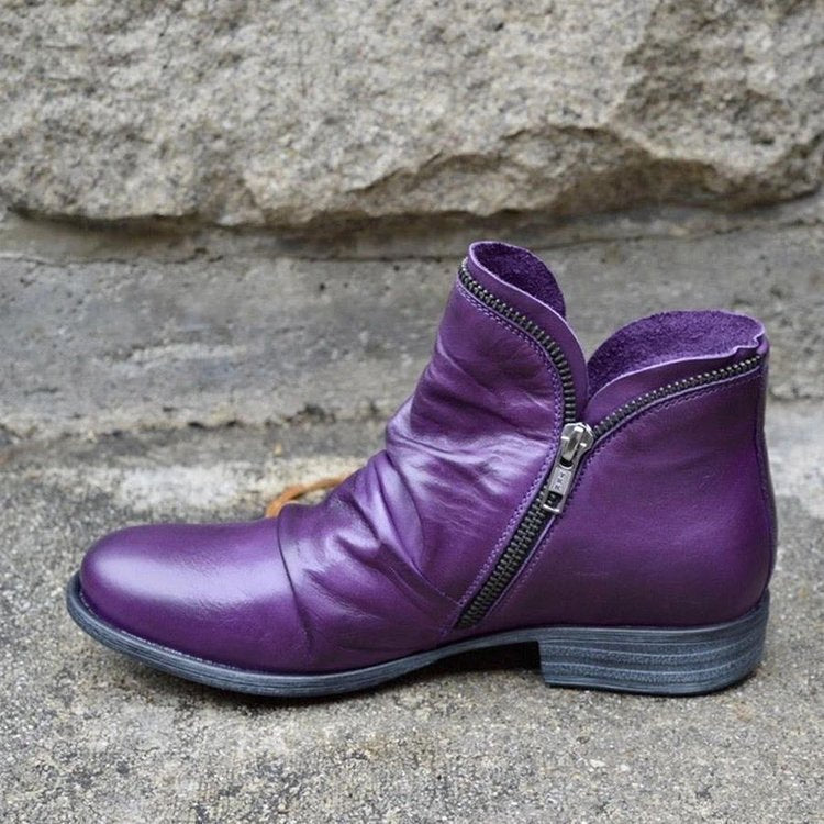 Women's ankle boots with ruched panels, side zips and low heels
