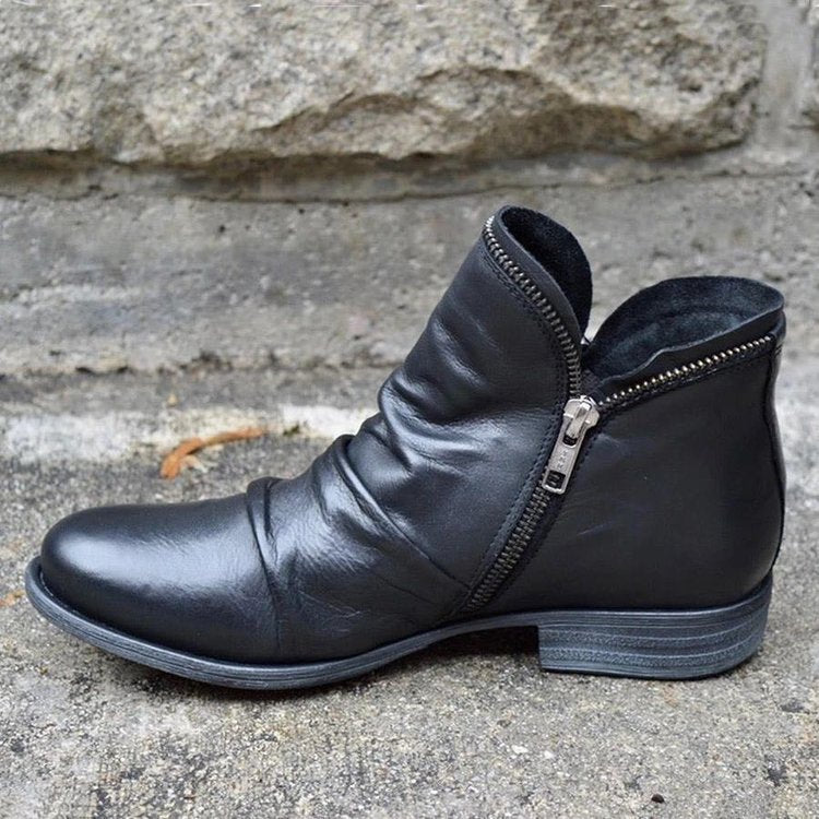 Women's ankle boots with ruched panels, side zips and low heels