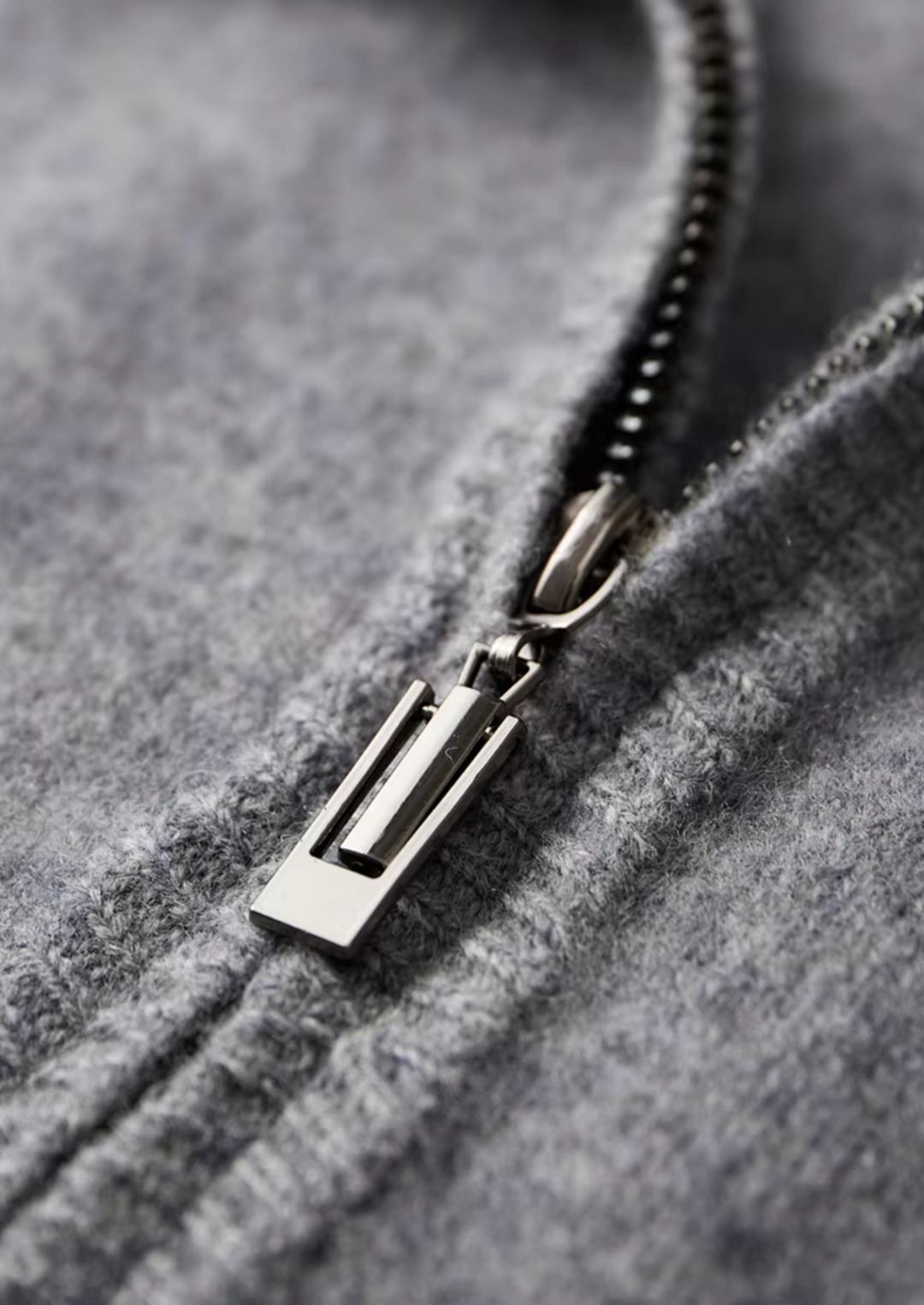 Men's two-tone grey knit tracksuit set with a zip jacket and drawstring trousers