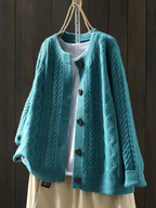Women's cable-knit cardigan with crew neckline, long sleeves and button front
