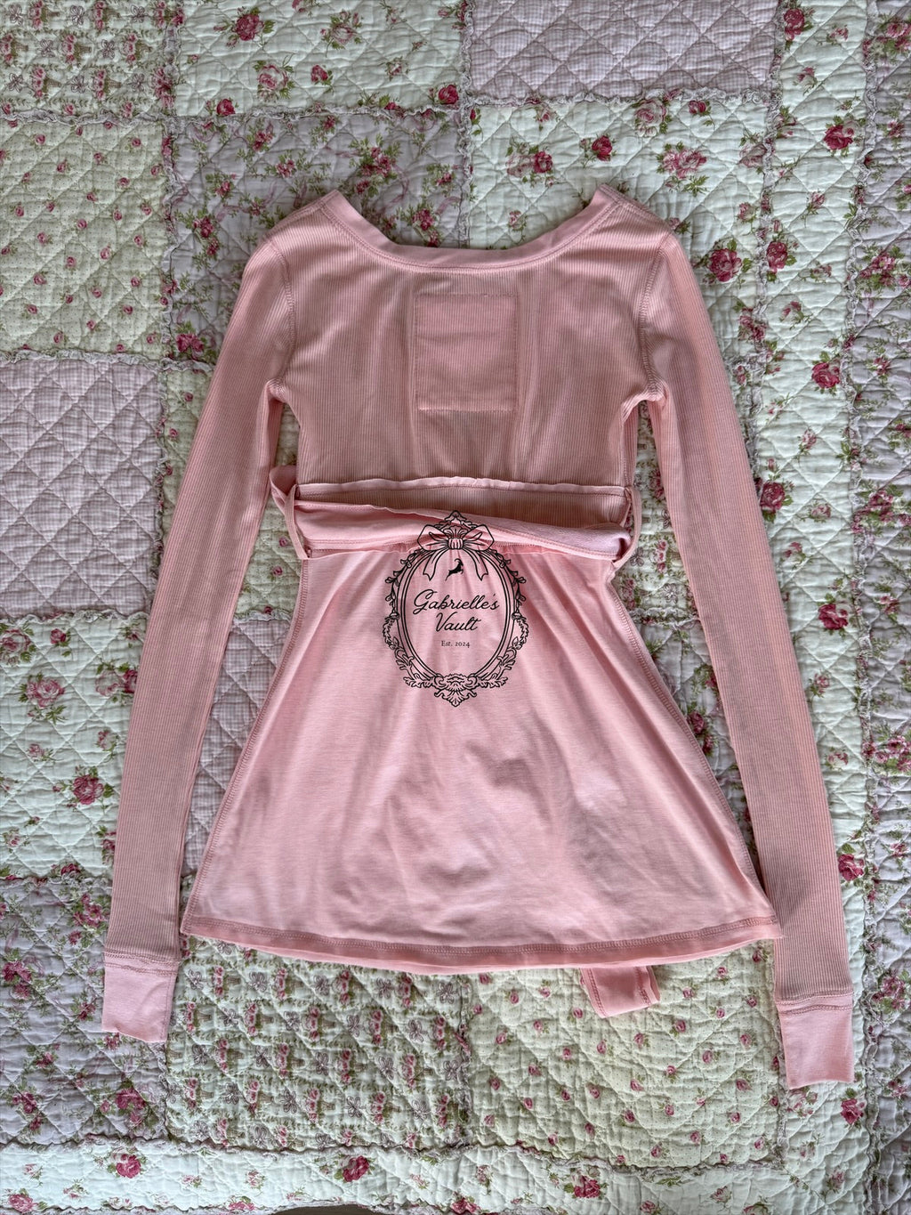 Women's wrap babydoll top with long sleeves and waist ties
